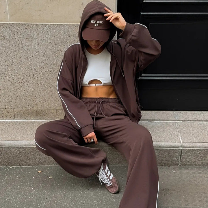 Damer sportig hoodie set med lös passform och dekorativa pipingsdetaljer Mirla-Eva Jonsson