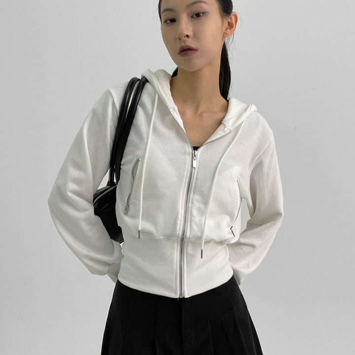 Damer sportig zip hoodie med en figurnära passform Mirla-Eva Jonsson