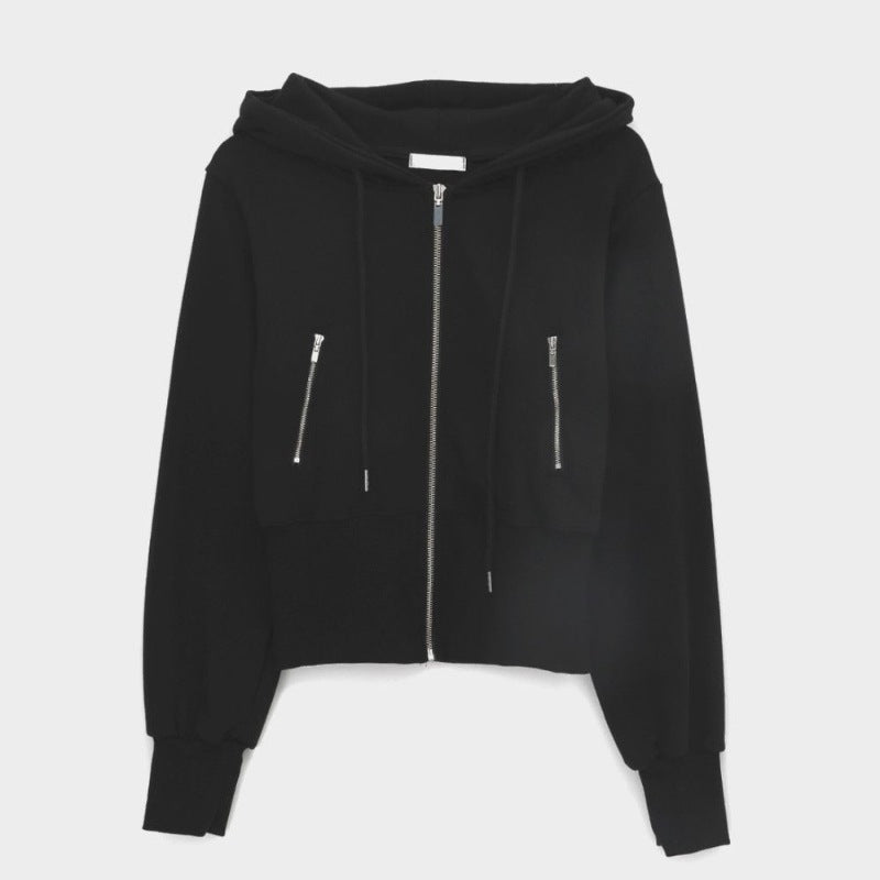 Damer sportig zip hoodie med en figurnära passform Mirla-Eva Jonsson