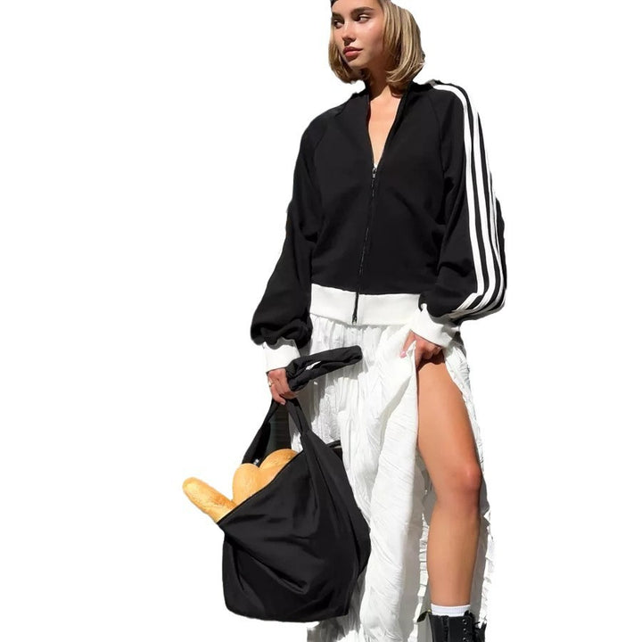 Damer sportig zip-jacka med innovativa puffärmlar Mirla-Eva Jonsson