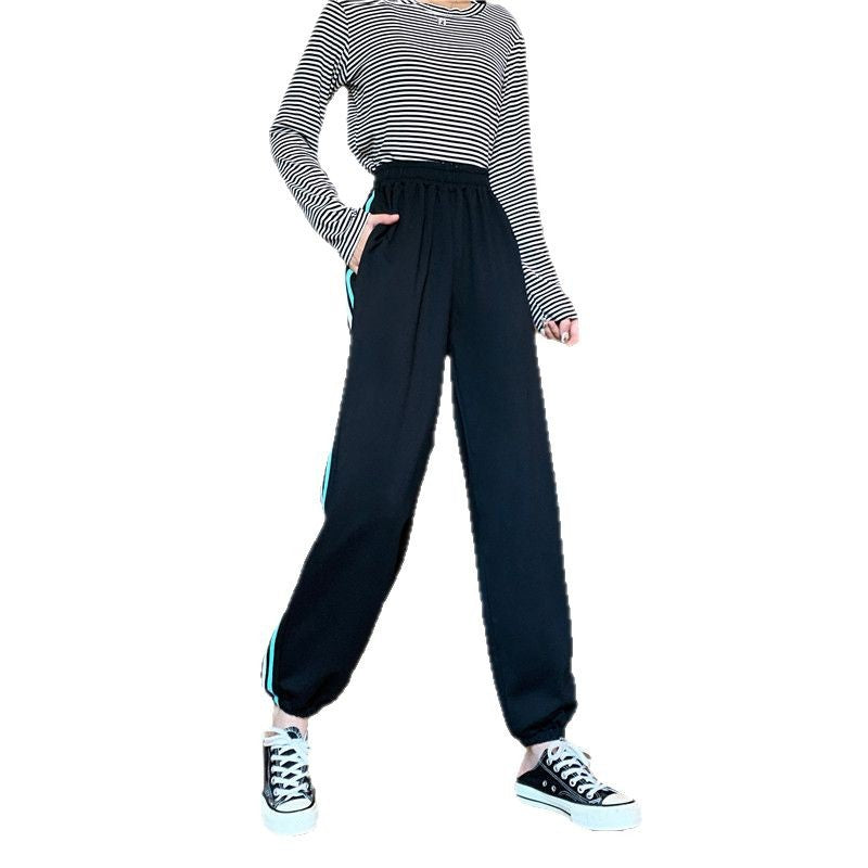 Damer sportiga joggingbyxor med stiliga sidoinlägg Mirla-Eva Jonsson