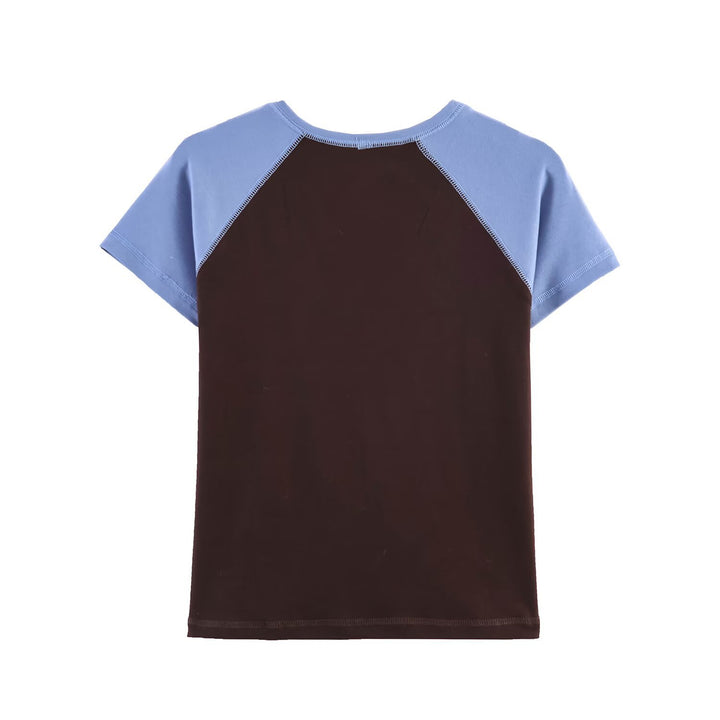Damer sportigt T-shirt med kontrastärmar och avslappnad passform Mirla-Eva Jonsson