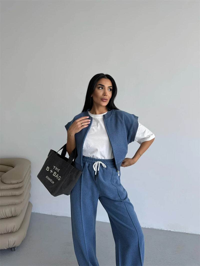 Damer sportigt Twin-Set med kort dragkedja och vida byxor Mirla-Eva Jonsson