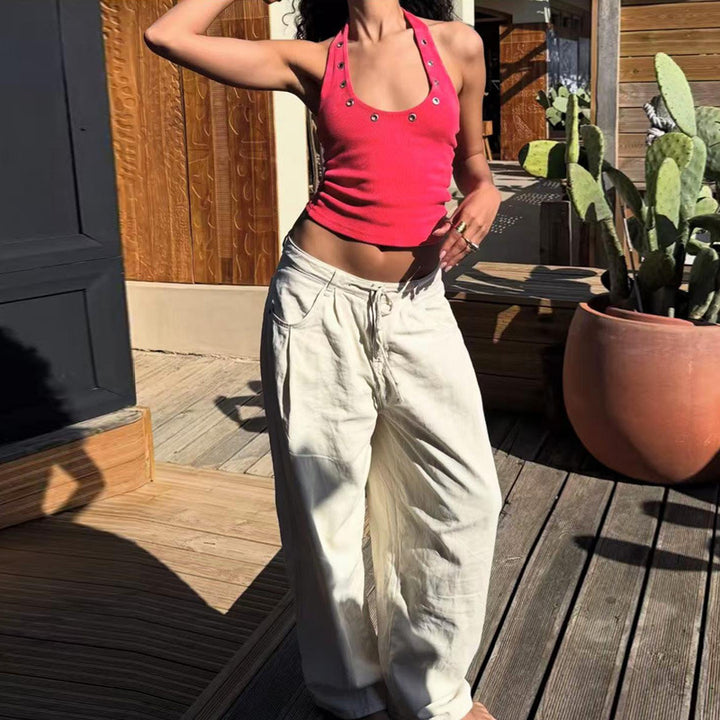 Damer sportigt linne med trendiga detaljer och djup ringning Mirla-Eva Jonsson