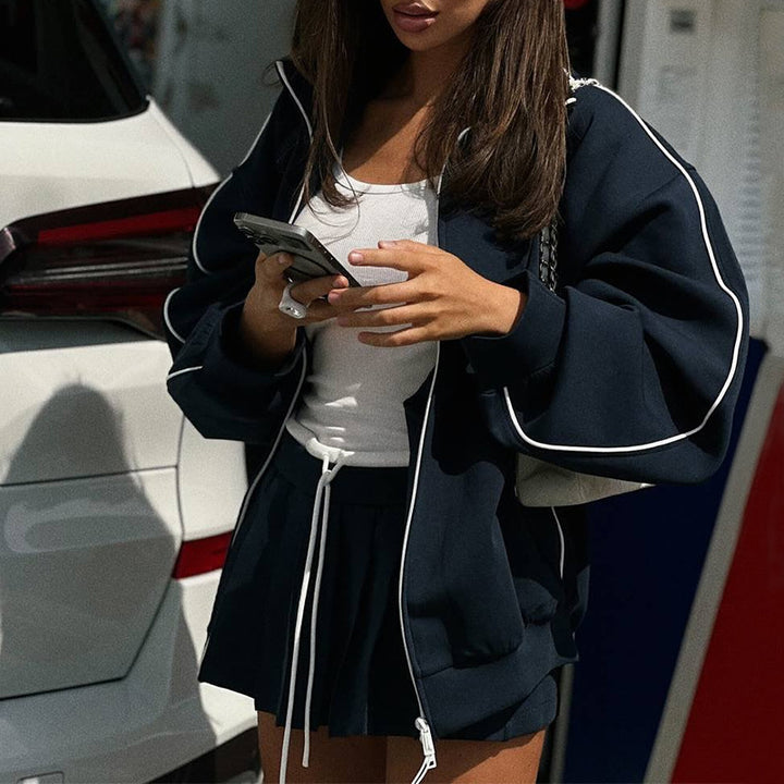 Damer sportigt loungewear-kombinationsset med korta byxor och avslappnad topp Mirla-Eva Jonsson