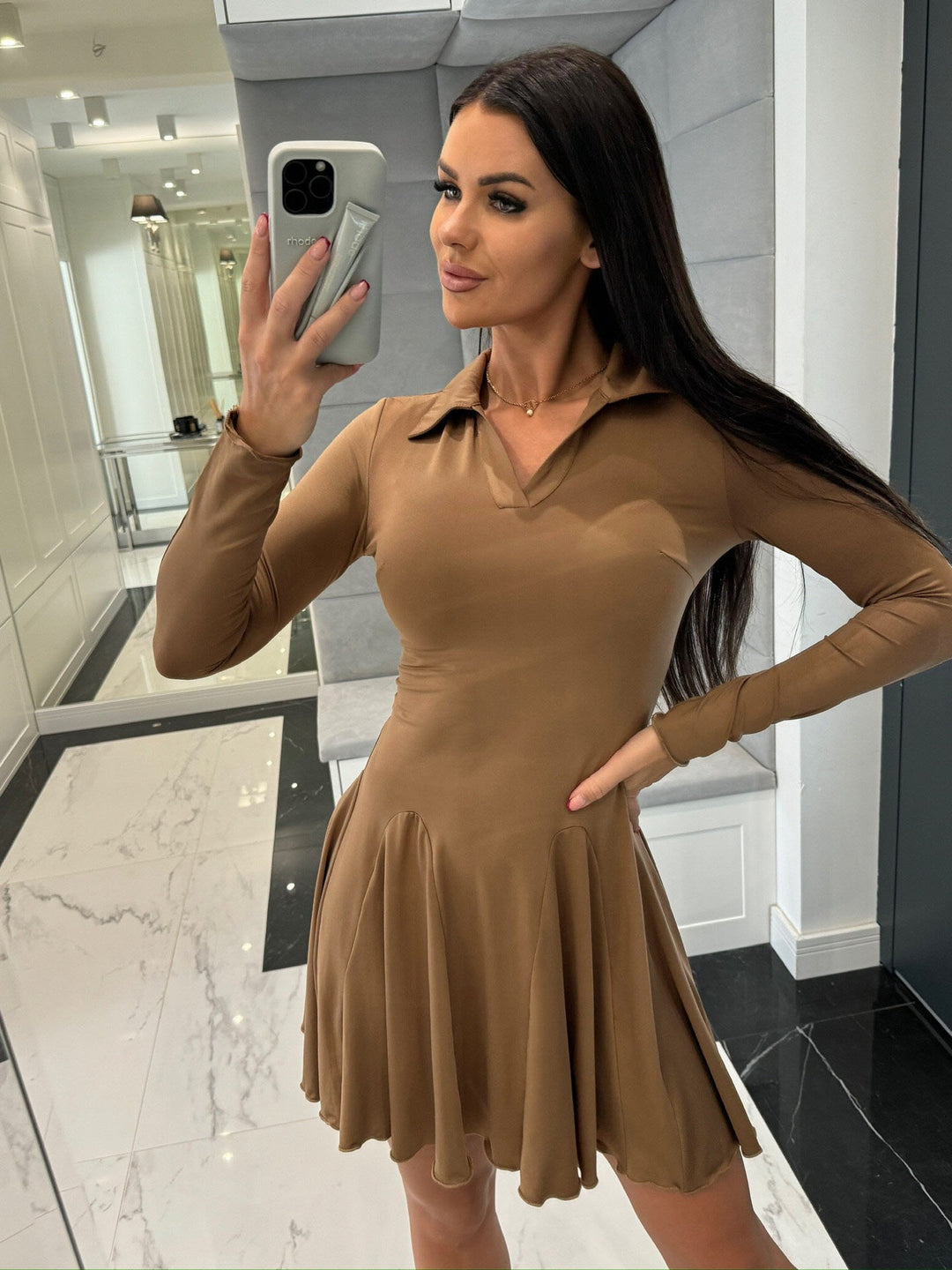 Damer sportklänning med polokrage och svängande kjol Mirla-Eva Jonsson