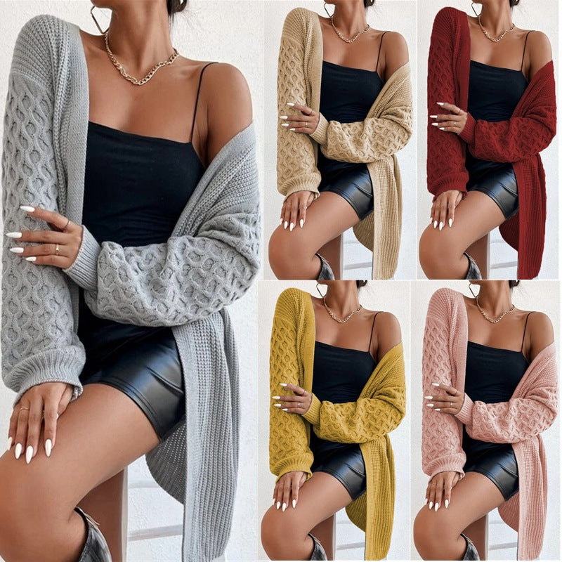 Damer stickad cardigan med asymmetrisk design och djupa fickor Eva Jonsson-Eva Jonsson