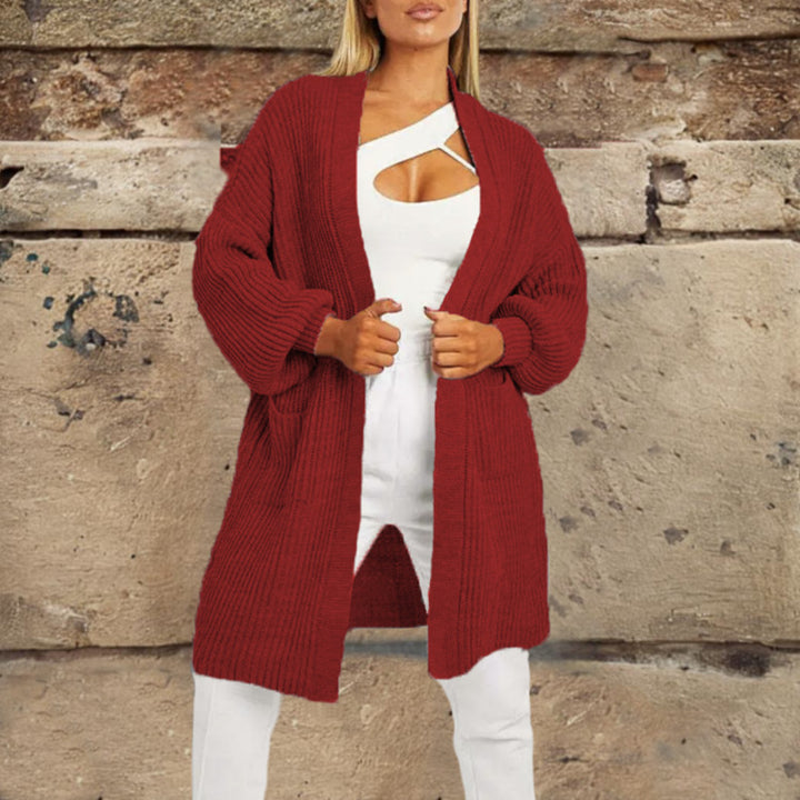 Damer stickad cardigan med djupt snitt och praktiska fickor Eva Jonsson-Eva Jonsson