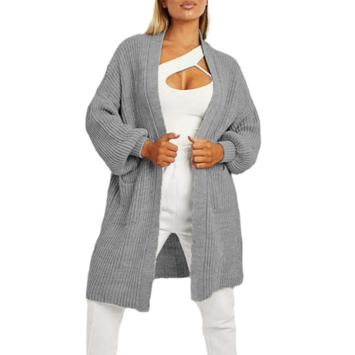 Damer stickad cardigan med djupt snitt och praktiska fickor Eva Jonsson-Eva Jonsson