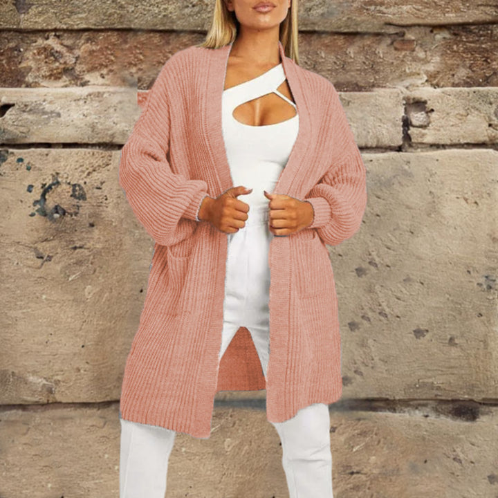 Damer stickad cardigan med djupt snitt och praktiska fickor Eva Jonsson-Eva Jonsson