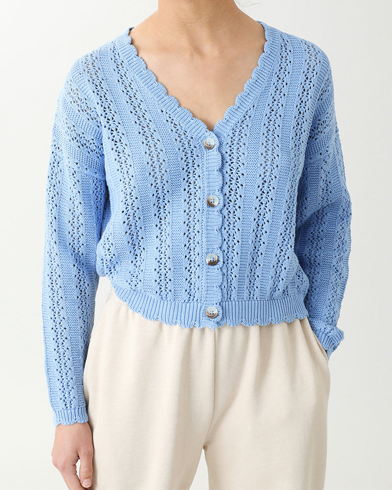 Damer stickad cardigan med feminin volang och knappdetaljer Mirla-Eva Jonsson