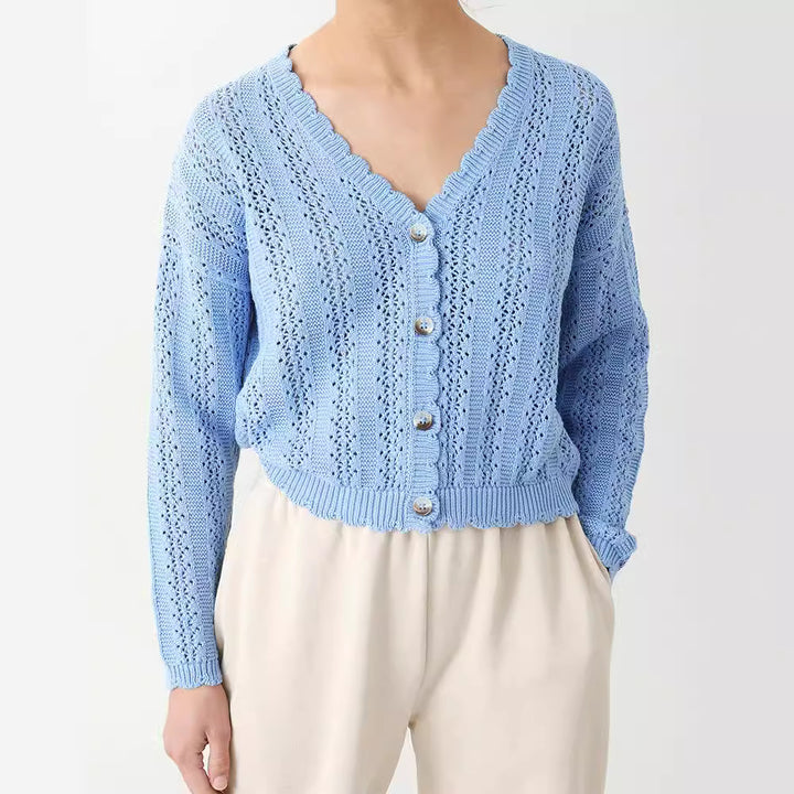 Damer stickad cardigan med feminin volang och knappdetaljer Mirla-Eva Jonsson