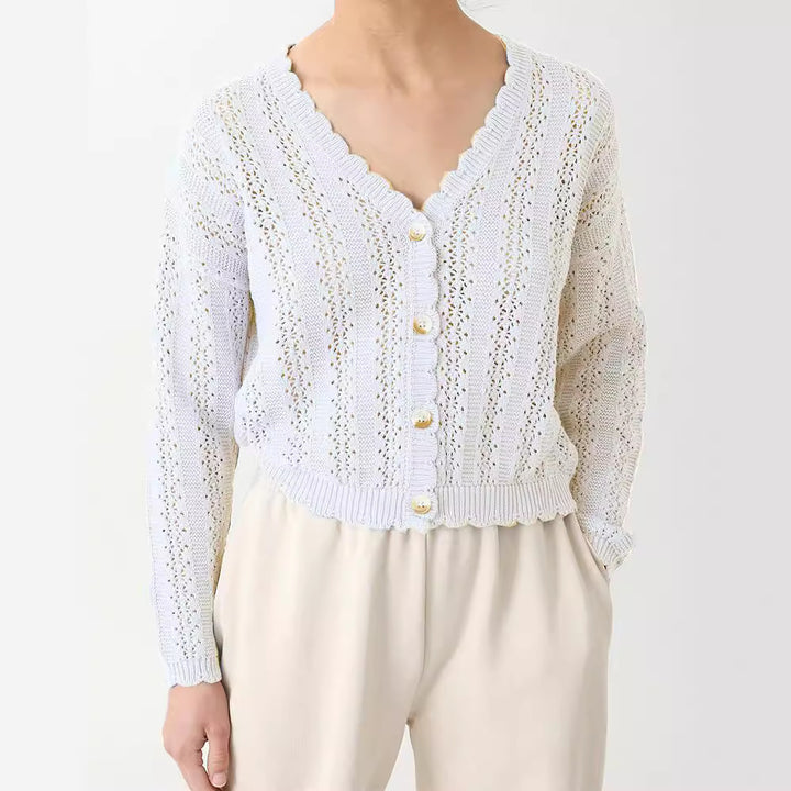 Damer stickad cardigan med feminin volang och knappdetaljer Mirla-Eva Jonsson