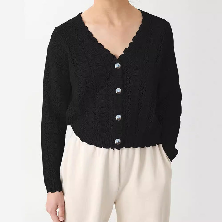 Damer stickad cardigan med feminin volang och knappdetaljer Mirla-Eva Jonsson