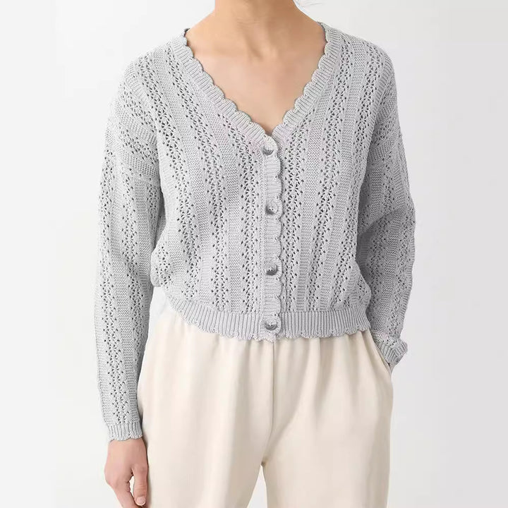 Damer stickad cardigan med feminin volang och knappdetaljer Mirla-Eva Jonsson