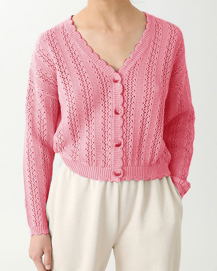 Damer stickad cardigan med feminin volang och knappdetaljer Mirla-Eva Jonsson