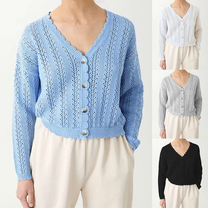 Damer stickad cardigan med feminin volang och knappdetaljer Mirla-Eva Jonsson