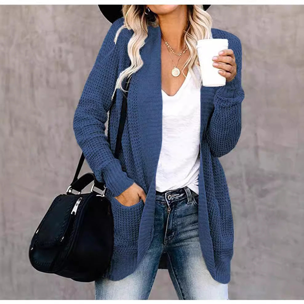 Damer stickad cardigan med öppen frontdesign och praktiska fickor Mirla-Eva Jonsson