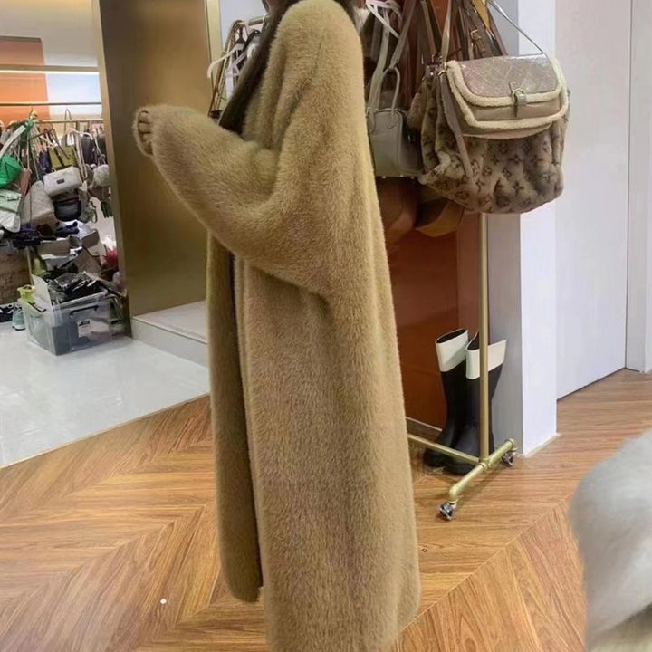 Damer stickad cardigan med öppen skärning och mjukt material Mirla-Eva Jonsson