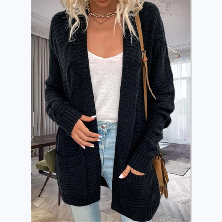 Damer stickad cardigan med strukturerad design och stora fickor Eva Jonsson-Eva Jonsson