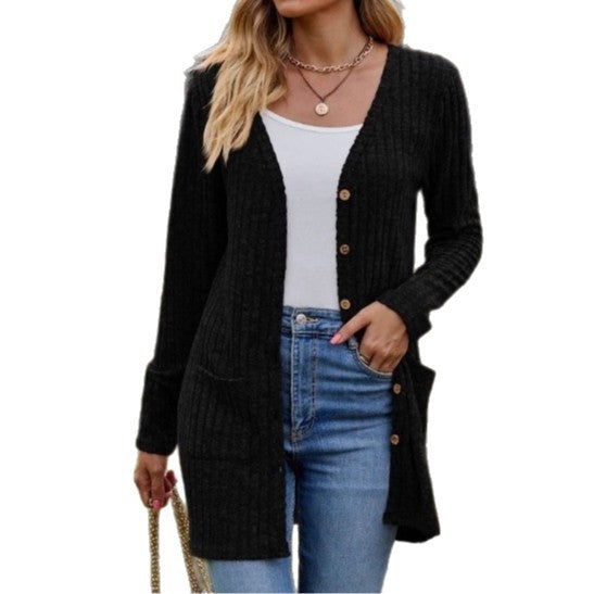 Damer stickad jacka med strukturerad design och praktiska fickor Mirla-Eva Jonsson