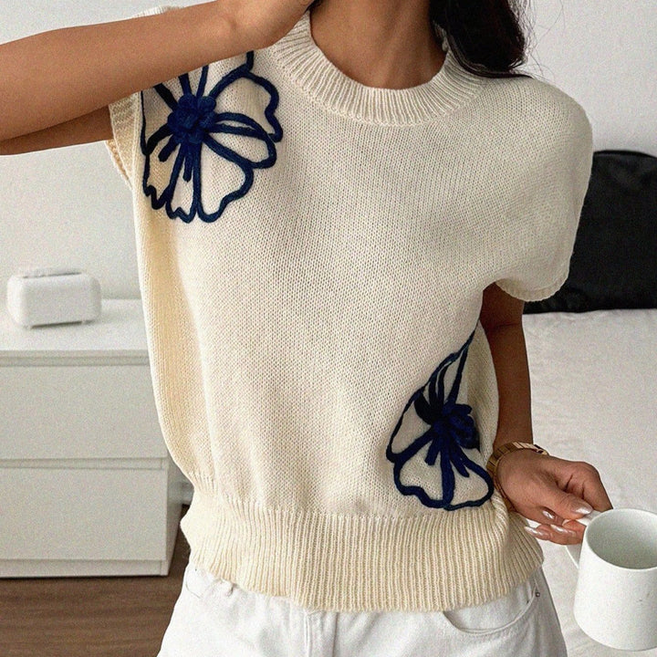 Damer stickad överdel med blommigt broderidesign Mirla-Eva Jonsson