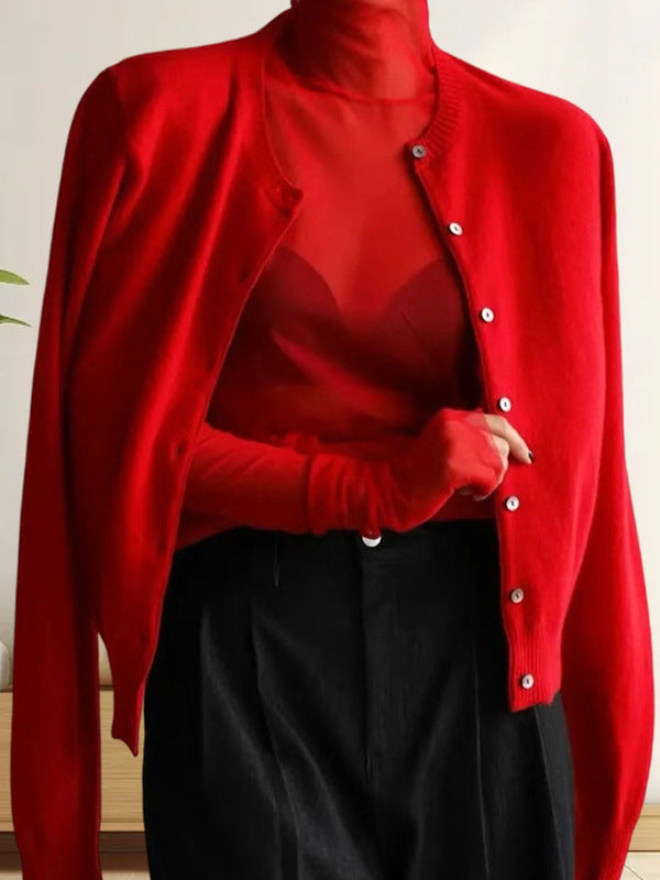 Damer stickad överdel med elegant knapplist och moderna detaljer Mirla-Eva Jonsson
