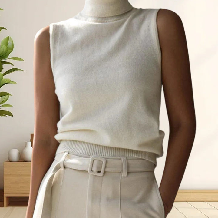 Damer stickad överdel med elegant knapplist och moderna detaljer Mirla-Eva Jonsson