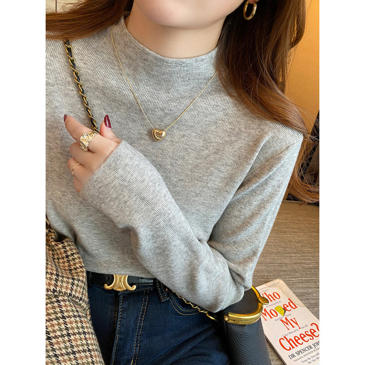 Damer stickad pullover med ståkrage och mjukt material Mirla-Eva Jonsson