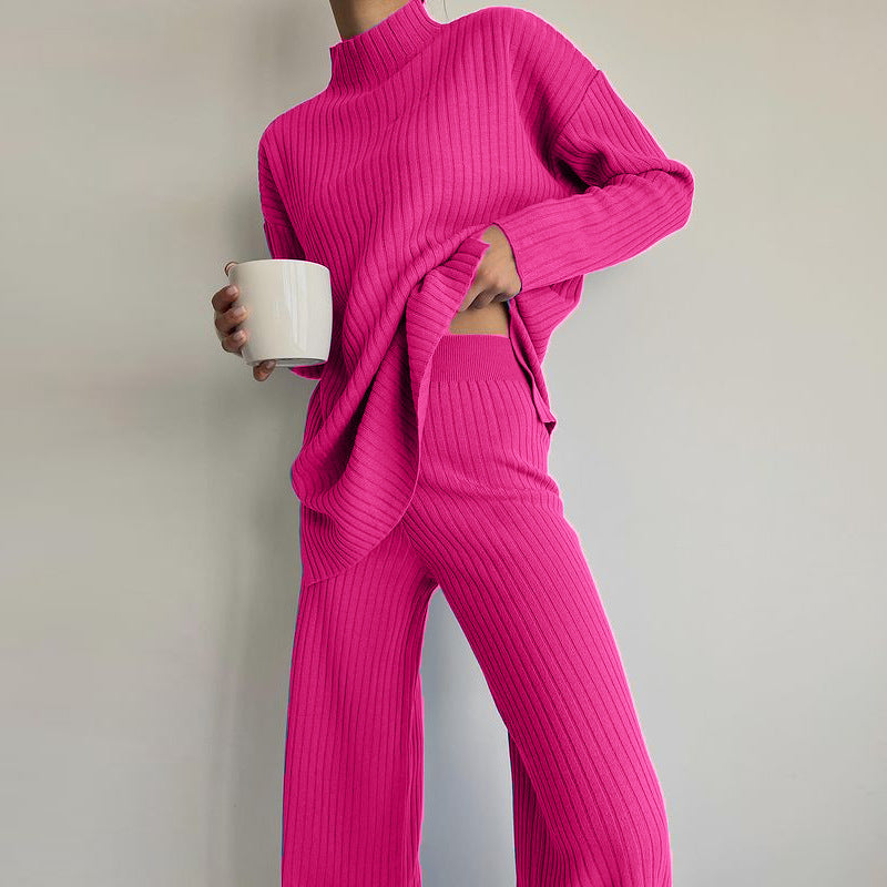 Damer stickad tröja i avslappnad oversized-stil med fin ribbstruktur och hög krage Mirla-Eva Jonsson