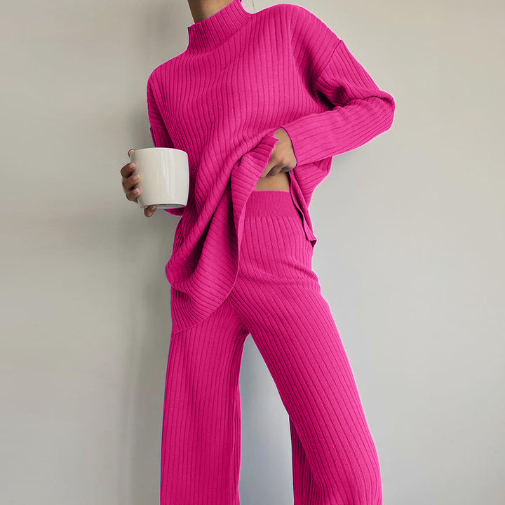 Damer stickad tröja i avslappnad oversized-stil med fin ribbstruktur och hög krage Mirla-Eva Jonsson