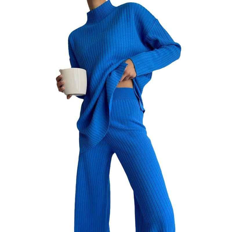 Damer stickad tröja i avslappnad oversized-stil med fin ribbstruktur och hög krage Mirla-Eva Jonsson