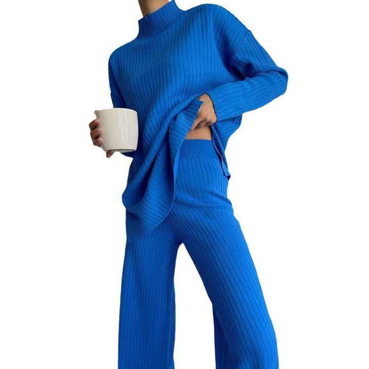 Damer stickad tröja i avslappnad oversized-stil med fin ribbstruktur och hög krage Mirla-Eva Jonsson