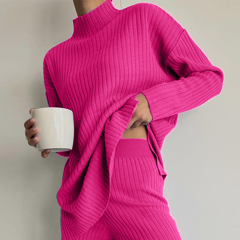 Damer stickad tröja i avslappnad oversized-stil med fin ribbstruktur och hög krage Mirla-Eva Jonsson