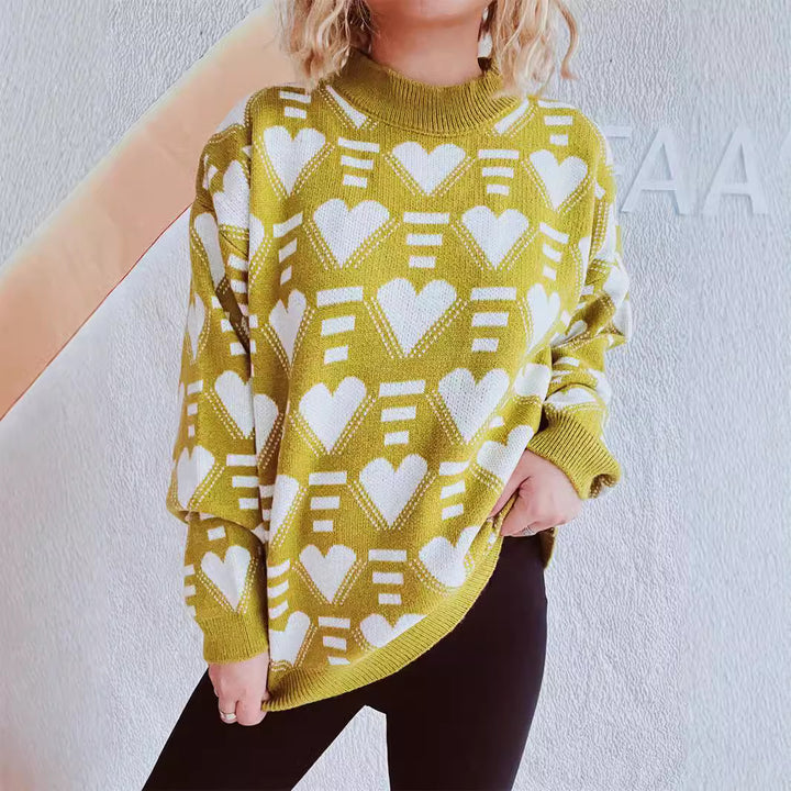 Damer stickad tröja i modern hjärt-design med vid passform Mirla-Eva Jonsson