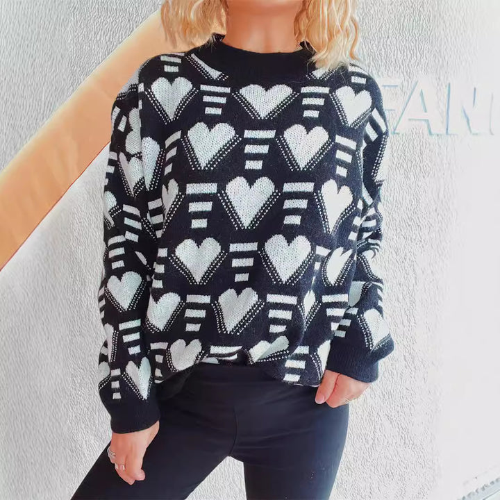 Damer stickad tröja i modern hjärt-design med vid passform Mirla-Eva Jonsson