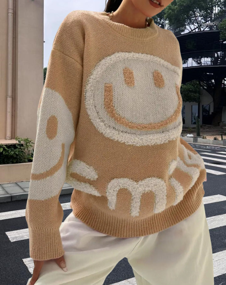 Damer stickad tröja med glatt emoji-motiv och bekväm passform Mirla-Eva Jonsson