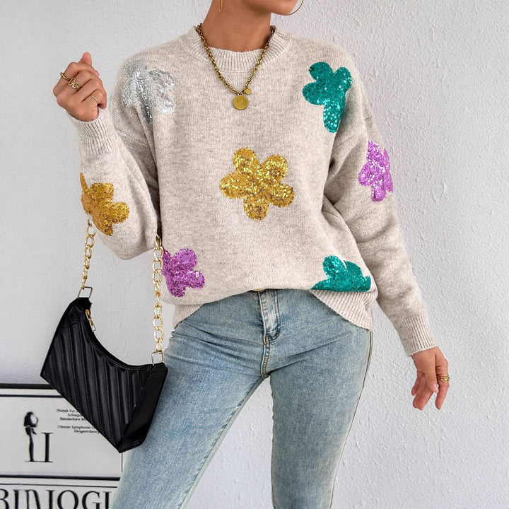 Damer stickad tröja med glittrande blomapplikationer Mirla-Eva Jonsson