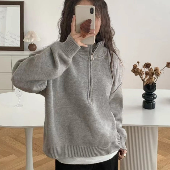 Damer stickad tröja med hög krage och fin ribbstickad struktur Mirla-Eva Jonsson