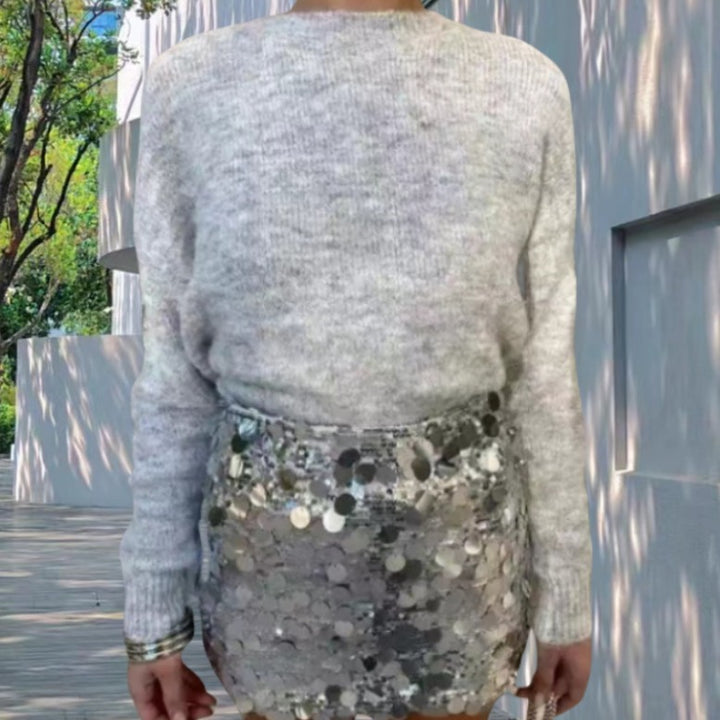 Damer stickad tröja med öppna ärmar och glittrande accenter Mirla-Eva Jonsson