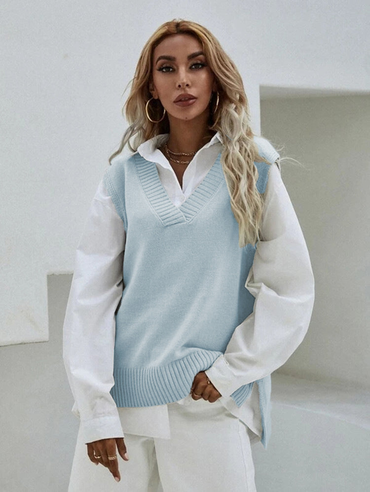 Damer stickad väst med V-urringning och elegant ribbstruktur Mirla-Eva Jonsson
