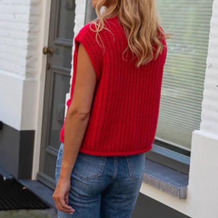 Damer stickad väst med dekorativa knappar och praktiska fickor Mirla-Eva Jonsson