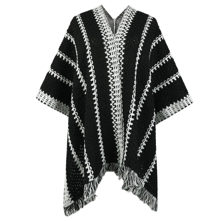 Damer stickponcho med V-ringning och fransar Mirla-Eva Jonsson