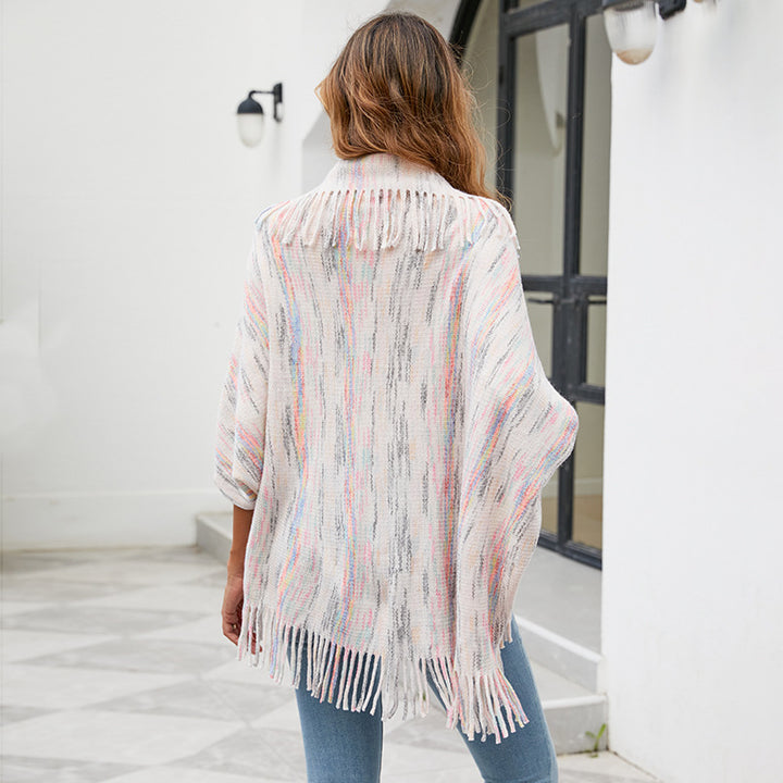 Damer stickponcho med lyxiga fransar och modern design Mirla-Eva Jonsson