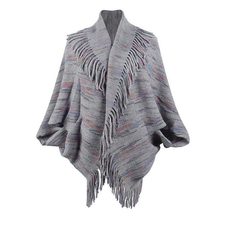 Damer stickponcho med lyxiga fransar och modern design Mirla-Eva Jonsson