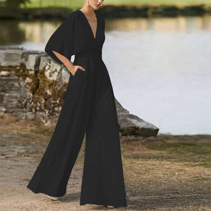 Damer stilfull jumpsuit med vida ben och elegant V-ringning Eva Jonsson-Eva Jonsson