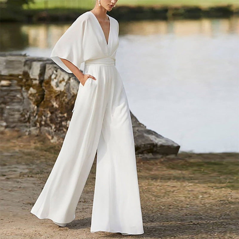 Damer stilfull jumpsuit med vida ben och elegant V-ringning Eva Jonsson-Eva Jonsson