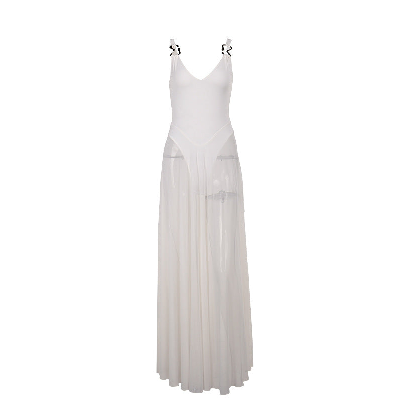 Damer stilfull maxi klänning med transparent kjol och elegant V-halsning Mirla-Eva Jonsson