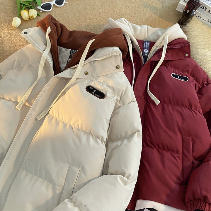 Damer stilfull quiltad jacka med integrerad hoodie Mirla-Eva Jonsson