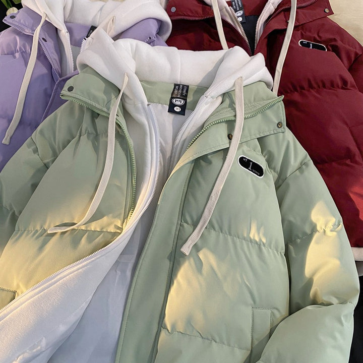 Damer stilfull quiltad jacka med integrerad hoodie Mirla-Eva Jonsson